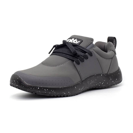 Men's Spacecloud - Charcoal is a gray athletic work sneaker featuring black laces, a black sole with white speckles, and a pull tab at the heel. Designed with slip-resistant features for added safety, this style also showcases a white logo on the tongue.