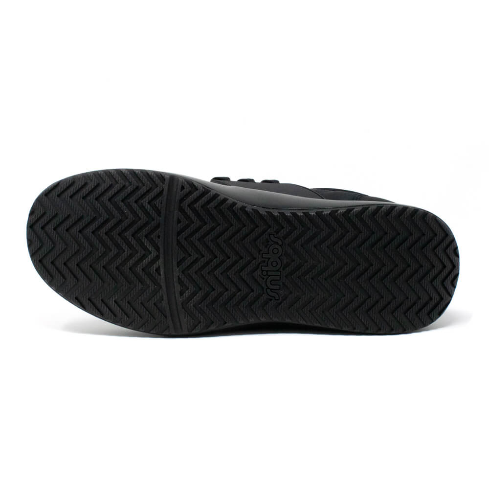 The Snibbs Men's Spacecloud - Eclipse Black features a black sole with a herringbone tread pattern and a centrally placed logo, engineered for slip-resistant performance and shown on a white background.