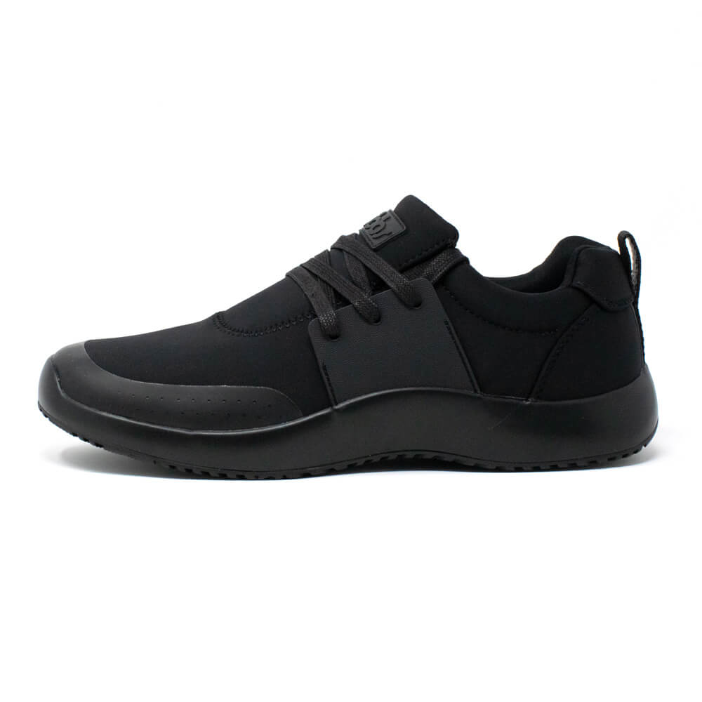 The Snibbs Men's Spacecloud - Eclipse Black is a black athletic work sneaker featuring a low profile, black laces, and a thick, textured slip-resistant sole, shown from the side on a white background.