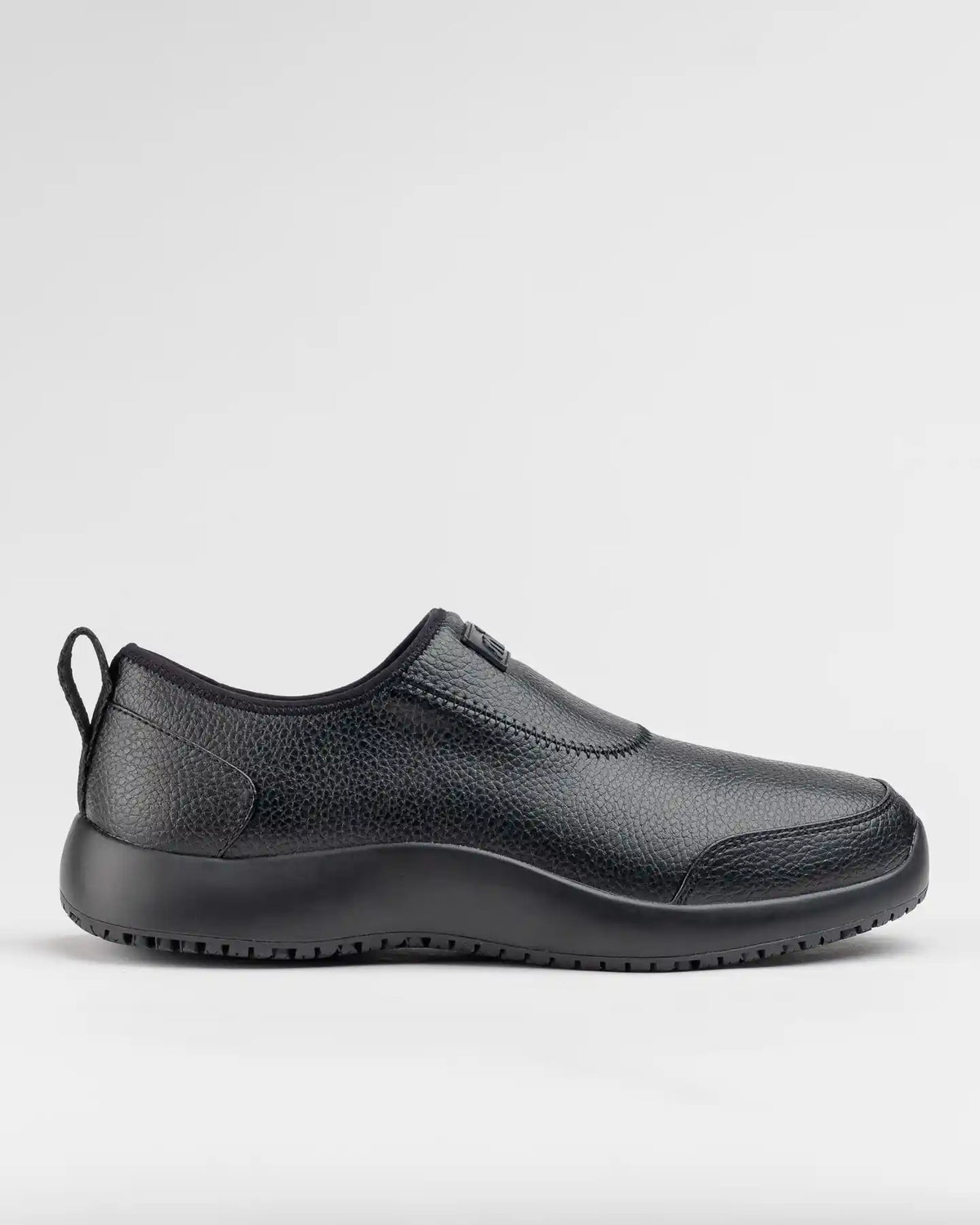 Snibbs Spacecloud Premium Slip-On 2.0 in Eclipse Black: vegan leather, slip resistant, low profile, pull tab; shown on plain background.