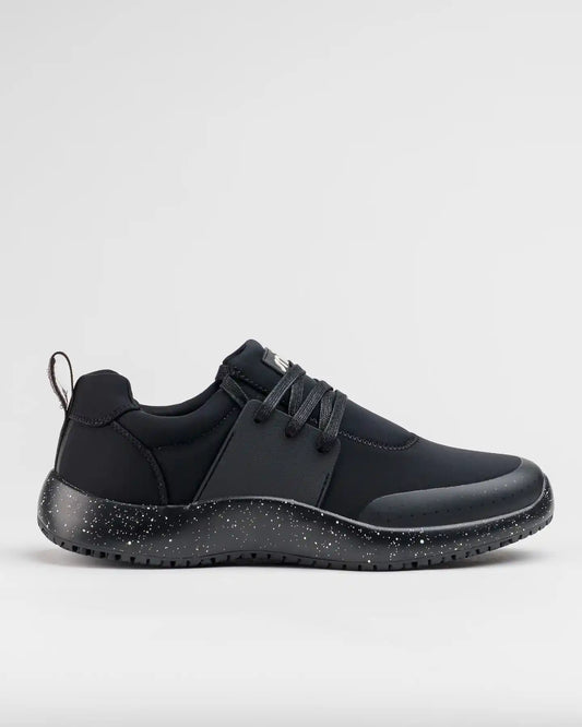 Snibbs Spacecloud 2.0 - Black Speckle: vegan, slip-resistant work sneaker with lace-up closure and pull tab, on plain background.