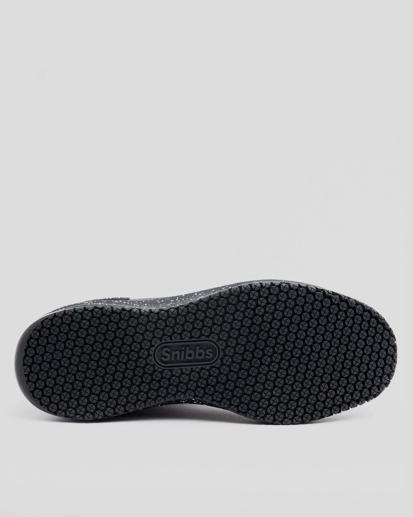 Black Speckle shoe sole with hexagonal tread, non-slip rubber outsole, Snibbs logo in center, shown on gray background.