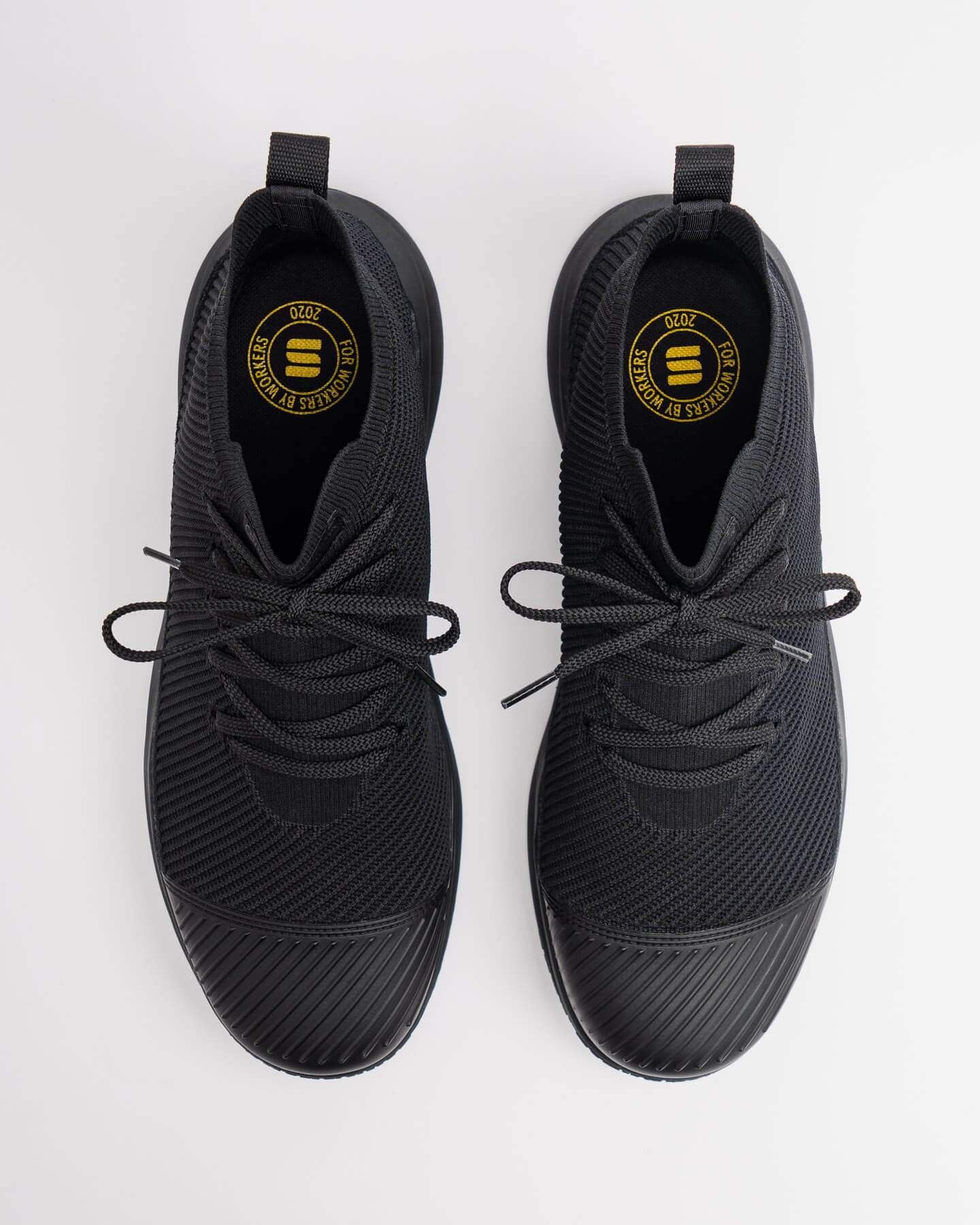Top view of Snibbs ROVR Mid - Eclipse Black (VN) with slip-resistant soles and knit upper, displayed on a white background.