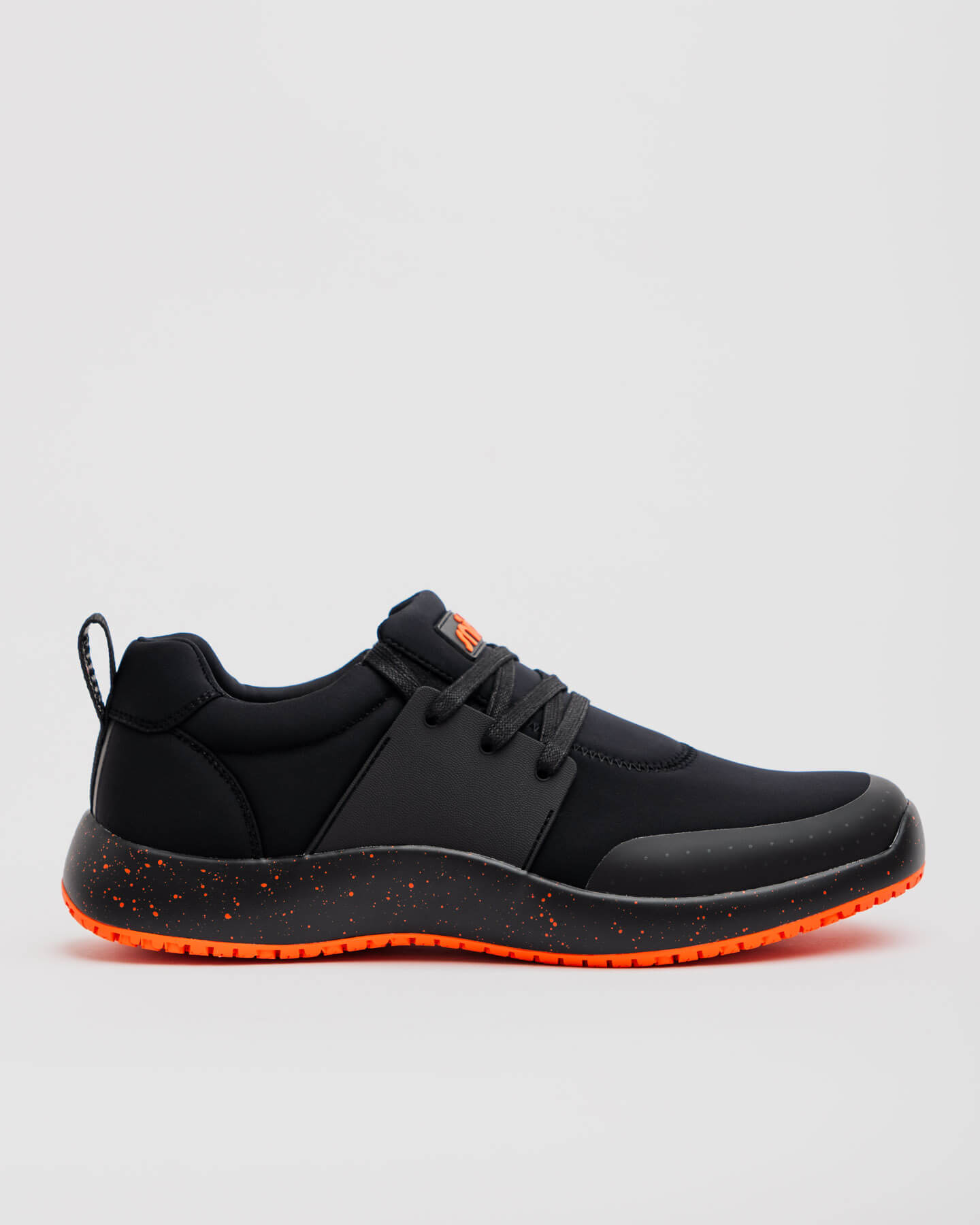 Snibbs Spacecloud 2.0 - Tangerine: black vegan work sneaker with orange-speckled sole, slip resistant, shown in profile on white.