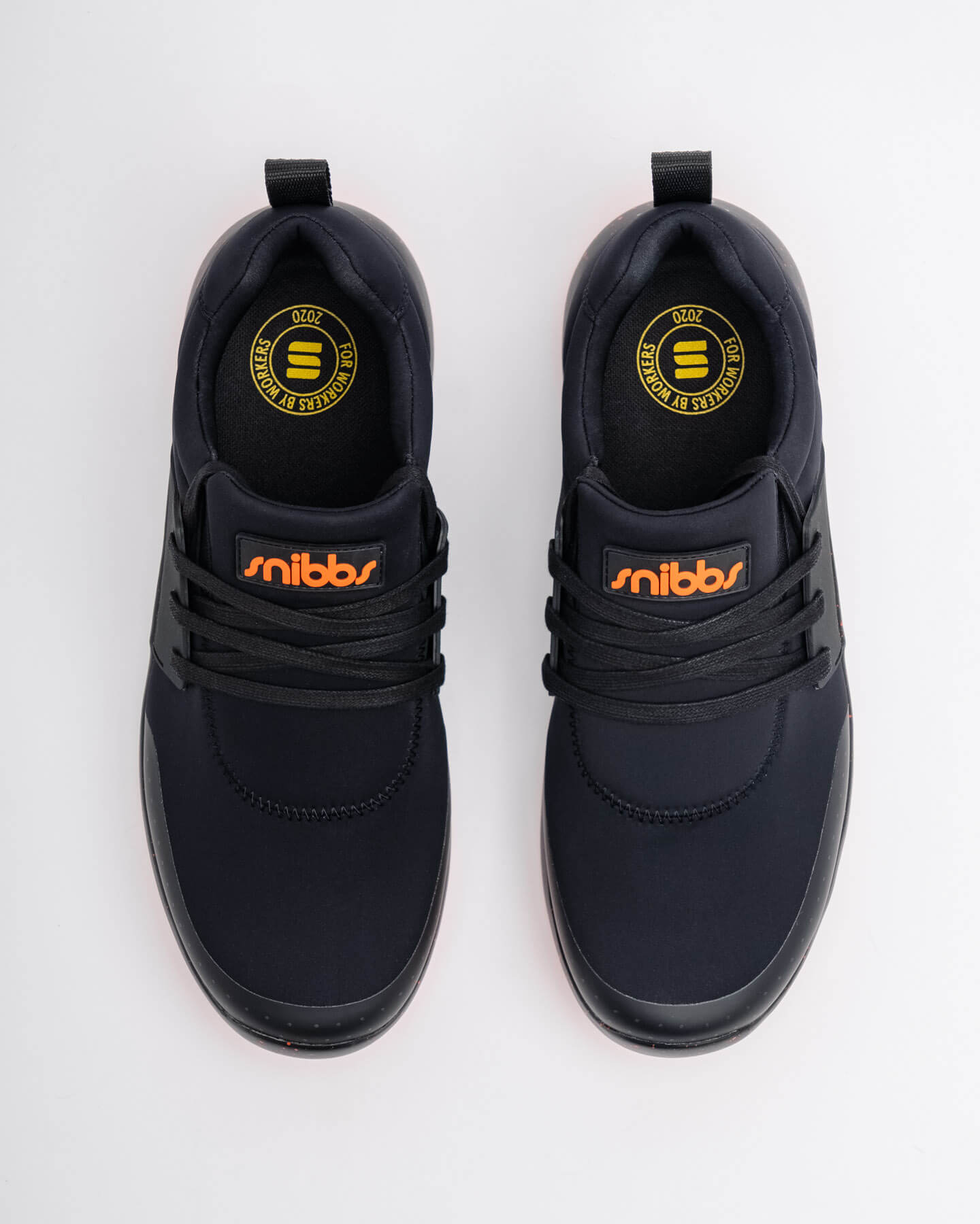 Top view of Snibbs Spacecloud 2.0 - Tangerine vegan work sneakers with slip-resistant soles and orange tags.